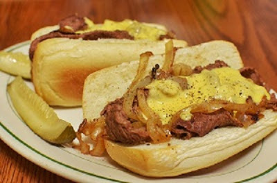 Cheesesteak sandwiches with pickles